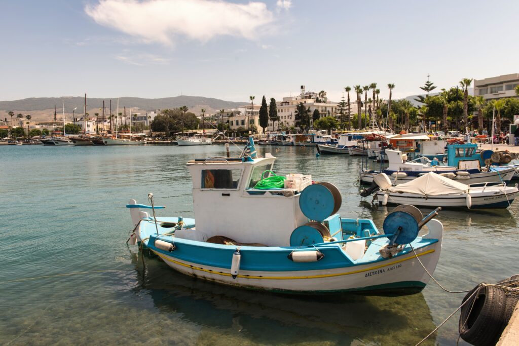 Kardamena waterfront and fishing boats in Kos Greece