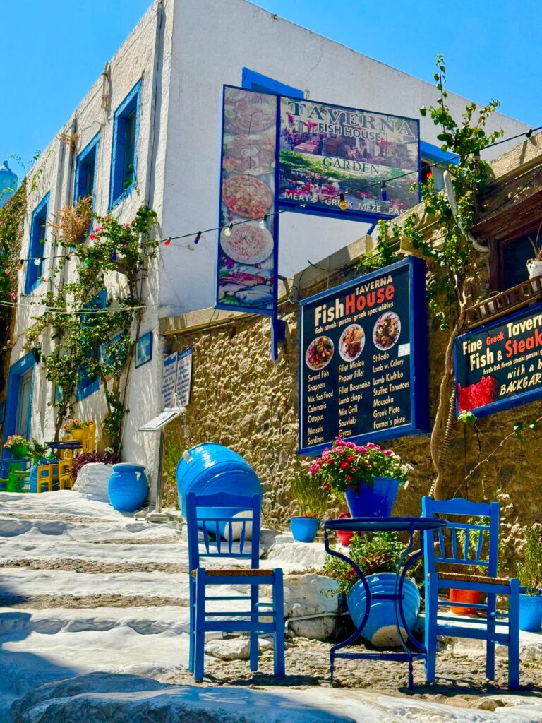 Traditional Greek taverna in Kos Town with blue and white details