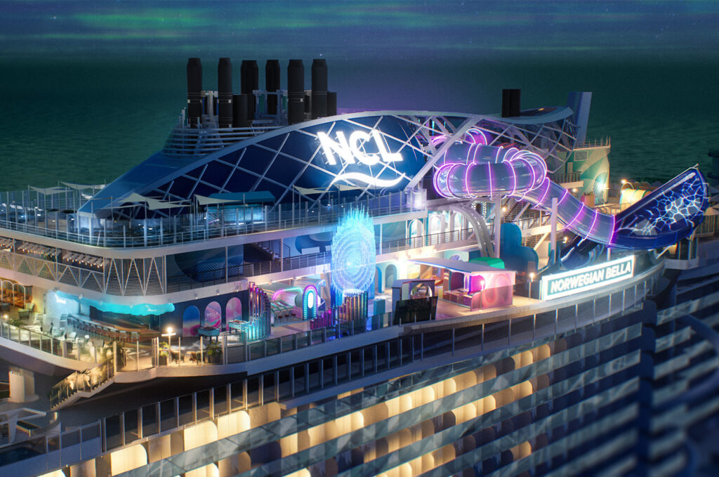 Norwegian Bella Ocean Heights illuminated at night with LED effects