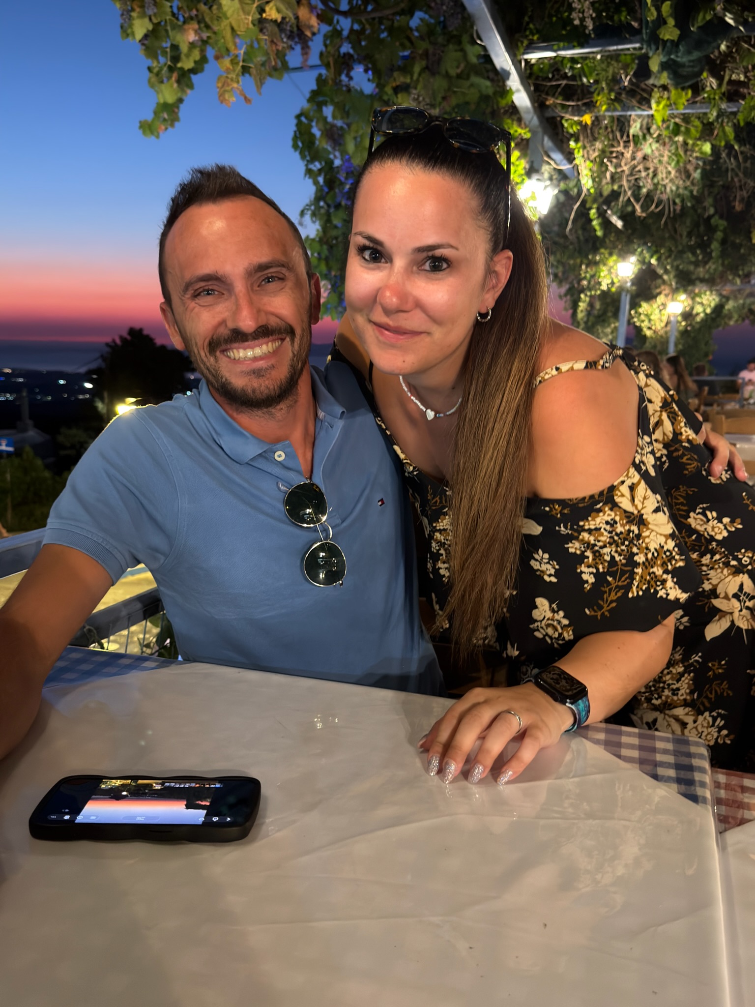 Couple having dinner in Zia during a sunset in Kos Greece